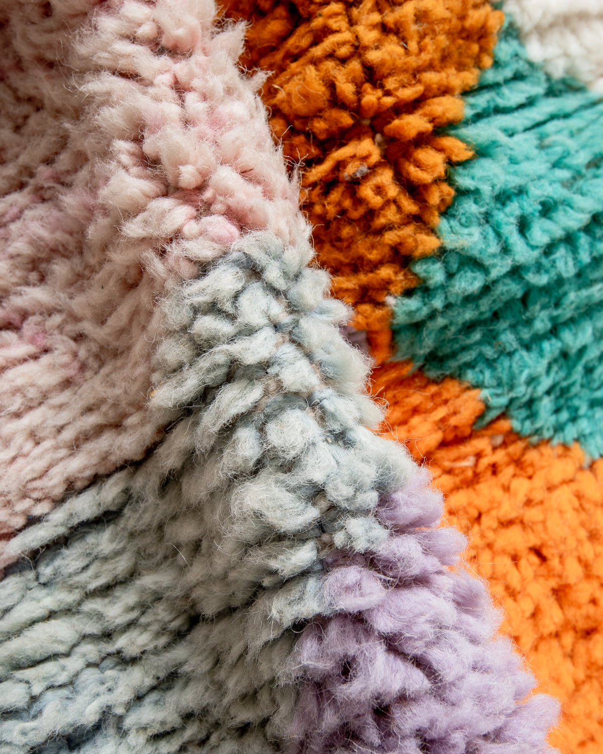 Modern, designer, handcrafted Berber rug from Morocco. Beniourain carpet with beautiful colours and patterns and fluffy wool texture.